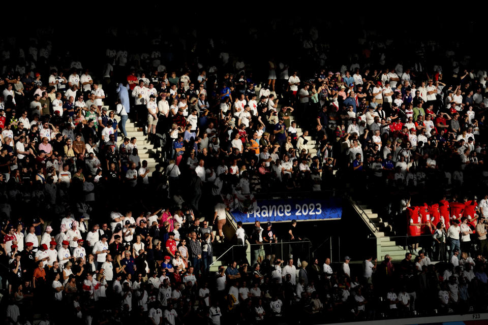 Fans attend the Rugby World Cup Pool D match between England and Samoa at the Stade Pierre Mauroy in Villeneuve-d'Ascq, outside Lille, France, Saturday, Oct. 7, 2023. (AP Photo/Themba Hadebe)