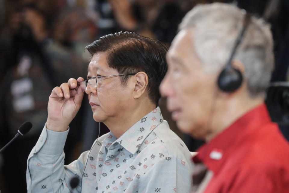Philippine President Ferdinand Marcos Jr., left, and Singapore's Prime Minister Lee Hsien Loong attend a retreat session at the 42nd ASEAN Summit in Labuan Bajo, East Nusa Tenggara province, Indonesia, Thursday, May 11, 2023. (Mast Irham/Pool Photo via AP)