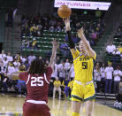 Baylor forward Caitlin Bickle (51) shoots over Oklahoma forward Madi Williams (25) during the first half of an NCAA college basketball game Tuesday, Feb. 7, 2023, in Waco, Texas. (Rod Aydelotte/Waco Tribune-Herald via AP)