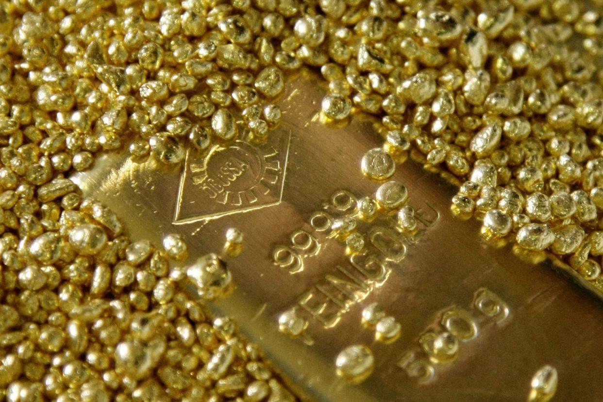 A file photo of gold bars and granules that are displayed in the Austrian Gold and Silver Separating Plant Oegussa in Vienna: REUTERS