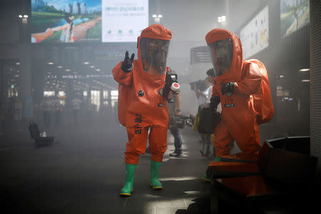 South Korean firefighters take part in an anti-terror drill as a part of the Ulchi Freedom Guardian exercise in Seoul, South Korea, August 23, 2017. REUTERS/Kim Hong-Ji