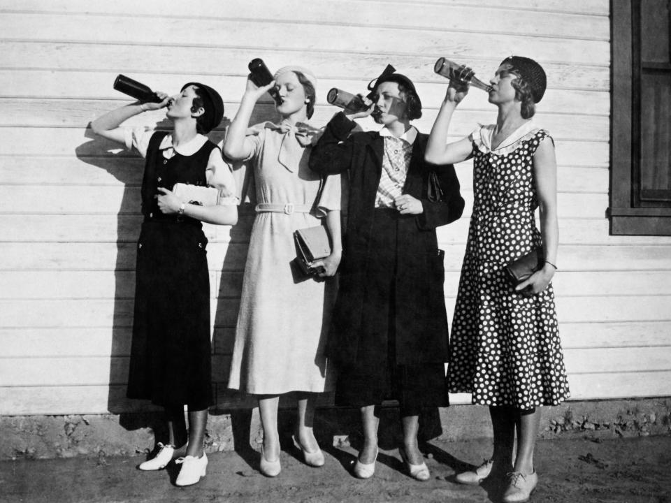 Women drinking liquor in 1925.