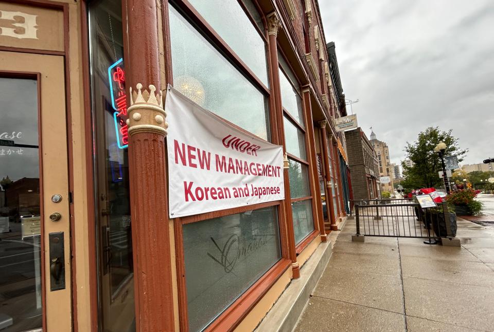 A sign showing that sushi restaurant Omakase is under new management hangs on the building on Friday, Oct. 13, 2023, in downtown Rockford.