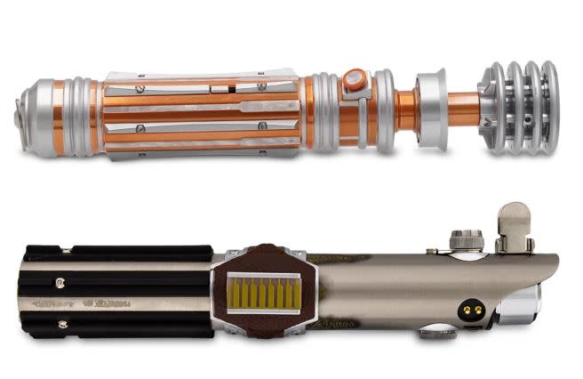 The Reforged Luke Skywalker replica lightsaber hilt and Leia Organ's lightsaber hilt. 