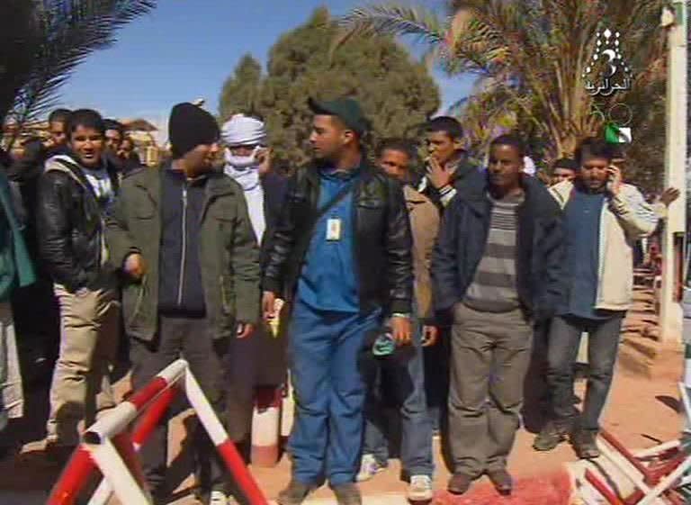 An image from Algeria's Al-Jazairia 3 TV on January 18, 2013 shows freed Algerian hostages after fleeing their Islamist captors following a deadly commando raid by Algerian forces at a desert gas field in In Amenas. Islamist hostage-takers at a remote Algerian gas field on Friday demanded a prisoner swap and an end to the French military campaign in Mali, a report said