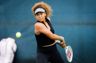 <p>Naomi Osaka has her eye on the ball on Aug. 15 during practice at the Western & Southern Open WTA 1000 tennis tournament outside of Cincinnati.</p>