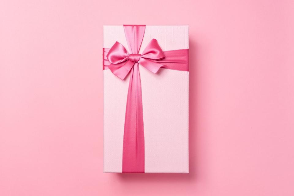 pink colored gift box on pink