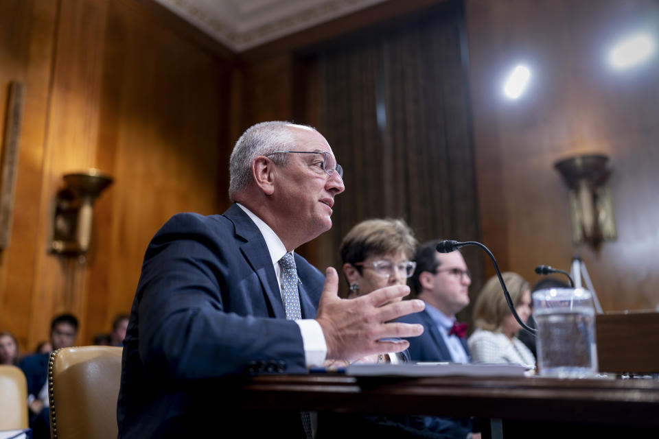 Louisiana Governor John Bel Edwards testifies as the Senate Budget holds a hearing to examine the fiscal consequences of climate change on infrastructure, at the Capitol in Washington, Wednesday, July 26, 2023. (AP Photo/J. Scott Applewhite)