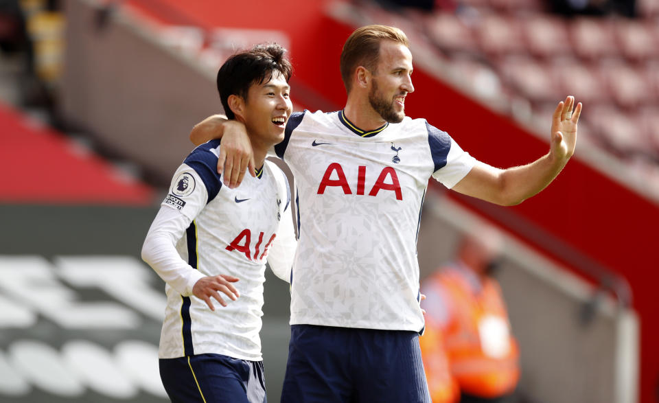 Tottenham Hotspur's Son Heung-min (left) celebrates scoring his side's third goal of the game during the Premier League match at St Mary's Stadium, Southampton.