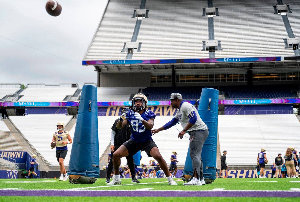 University of Washington Huskies tight end Devin Culp, 83, looks to catch the ball during a drill at the first day of Fall practice at Husky Stadium on Thursday, Aug. 4, 2022 in Seattle, Wash.