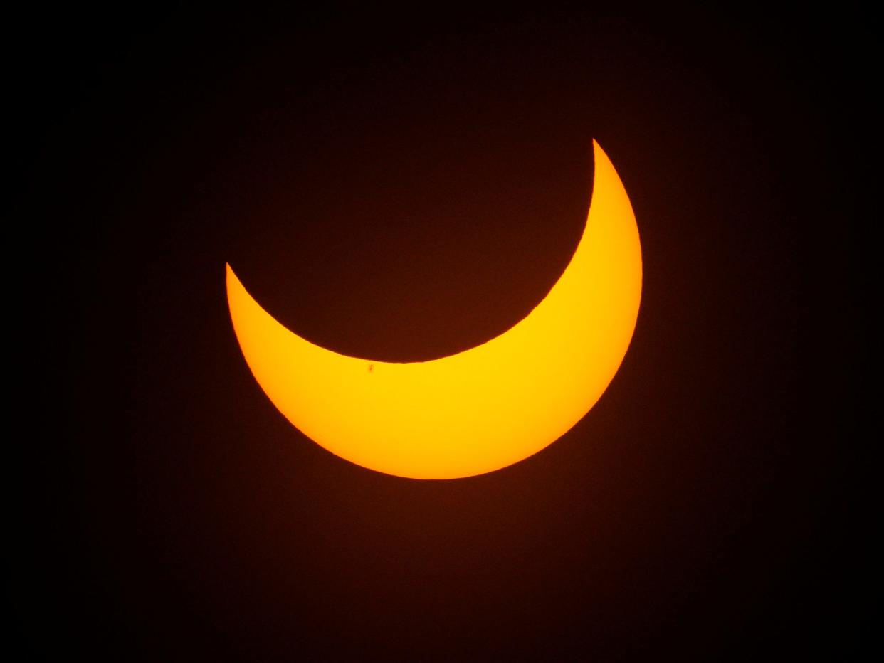 The solar eclipse seen in the Southwestern and Northwestern United States on Saturday, Oct. 14, 2023.
(Credit: Rob Schumacher, The Arizona Republic/USA TODAY NETWORK)