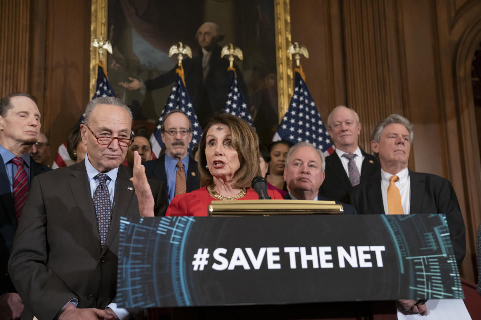 Speaker of the House Nancy Pelosi, D-Calif., joined by Senate Minority Leader Chuck Schumer, D-N.Y., left, announces the "Save The Internet Act," congressional Democrats' plan to reinstate "net neutrality" rules that President Donald Trump repealed in 2017, during an event at the Capitol in Washington, Wednesday, March 6, 2019. The bill is sponsored by Rep. Mike Doyle, D-Pa., right, with House Energy and Commerce Committee Chair Frank Pallone, D-N.J., far right. (AP Photo/J. Scott Applewhite)