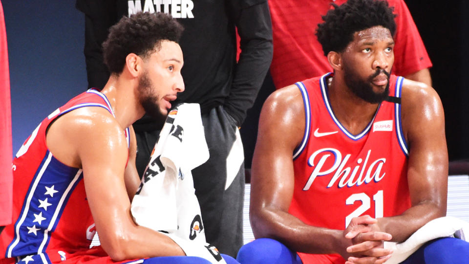 Ben Simmons is pictured in conversation with Philadelphia 76ers teammate Joel Embiid.