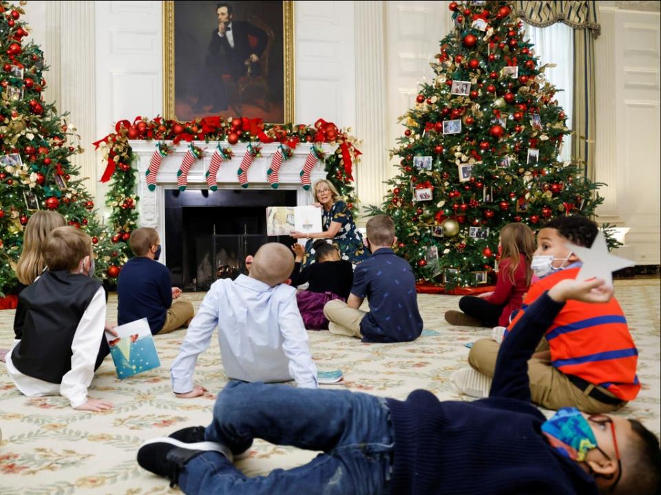 First lady Jilly Biden reads to children in the White House on 29 November, 2021 (Jonathan Ernst/Reuters)