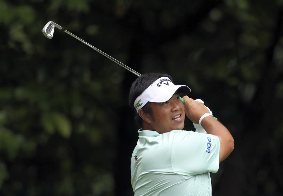 Thailand's Kiradech Aphibarnrat tees off on the 16th during day four of the PGA Championship at Wentworth Golf Club, Surrey, England, Sunday, Sept. 12, 2021. (Steven Paston/PA via AP)