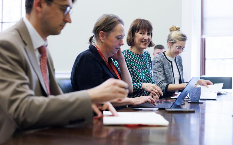 Smiling Chancellor Rachel Reeves meets senior business leaders at the Treasury