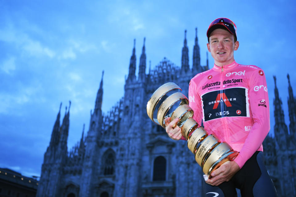 Tao Geoghegan Hart celebrates his victory in the Tour of Italy, one of cycling's three Grand Tours.