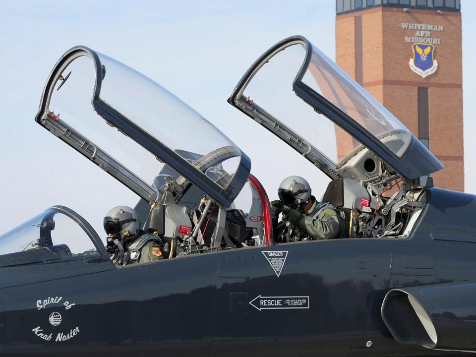 T-38 Talon pilots make their final adjustments in the cockpit before takeoff at Whiteman Air Force Base, Missouri.