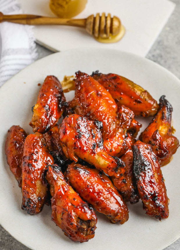 <p><a href="https://gritsandgouda.com/air-fryer-honey-bbq-chicken-wings-with-shortcuts/" rel="nofollow noopener" target="_blank" data-ylk="slk:Grits & Gouda;elm:context_link;itc:0;sec:content-canvas" class="link ">Grits & Gouda</a></p>