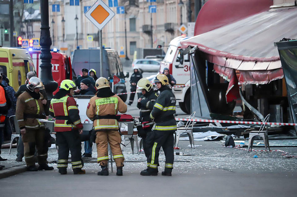 Medical personnel gather outside the site of an explosion at a cafe in St. Petersburg, Russia, on April 2.