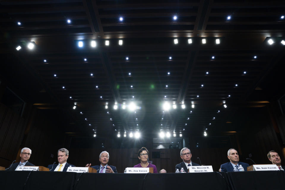 From left, Wells Fargo & Company CEO and President Charles Scharf, Bank of America Chairman and CEO Brian Thomas Moynihan, JPMorgan Chase & Company Chairman and CEO Jamie Dimon, Citigroup CEO Jane Fraser, Truist Financial Corporation Chairman and CEO William Rogers Jr., U.S. Bancorp Chairman, President, and CEO Andy Cecere, and The PNC Financial Services Group Chairman, President, and CEO William Demchak, attend a Senate Banking Committee annual Wall Street oversight hearing, Thursday, Sept. 22, 2022, on Capitol Hill in Washington. (AP Photo/Jacquelyn Martin)