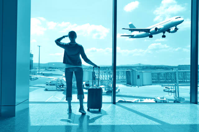 girl at the airport window