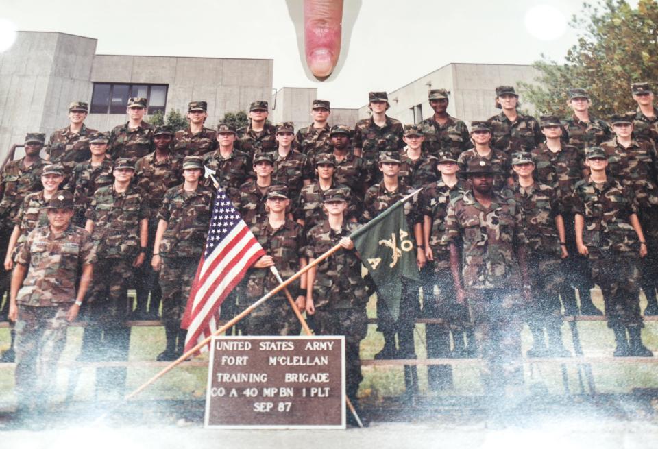 Ramona McGuire points to herself as a 19-year-old when in the U.S. Army Fort McClellan Training Brigade CO A 40 MP BN 1 PLT, September 1987.