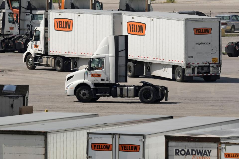 FILE - Yellow Corp. trucks navigate the YRC Freight terminal Friday, July 28, 2023, in Kansas City, Mo. Trucking company Yellow Corp. has shut down operations and is headed for a bankruptcy filing, Sunday, July 30, 2023, according to the Teamsters Union and multiple media reports. After years of financial struggles, reports of Yellow preparing for bankruptcy emerged last week — as the Nashville, Tennessee-based trucker saw customers leave in large numbers. (AP Photo/Charlie Riedel, File)