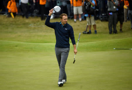 Golf - The 146th Open Championship - Royal Birkdale - Southport, Britain - July 23, 2017 USAÕs Jordan Spieth acknowledges the crowd after holing a putt on the 18th green to win The Open Championsip REUTERS/Hannah McKay