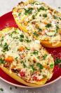 <p>Spaghetti squash turns one of favourite pasta dishes into a gluten-free, low carb treat! The perfect dinner to keep things fresh. </p><p>Get the <a href="https://www.delish.com/uk/cooking/recipes/a31659219/chicken-primavera-spaghetti-squash-boats-recipe/" rel="nofollow noopener" target="_blank" data-ylk="slk:Chicken Primavera Spaghetti Squash Boats;elm:context_link;itc:0;sec:content-canvas" class="link ">Chicken Primavera Spaghetti Squash Boats</a> recipe.</p>