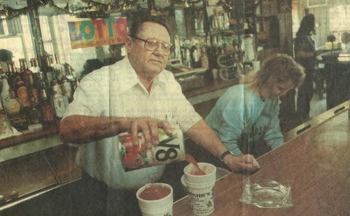 William “Bill” Spahr Jr. makes a Bloody Mary at the bar.