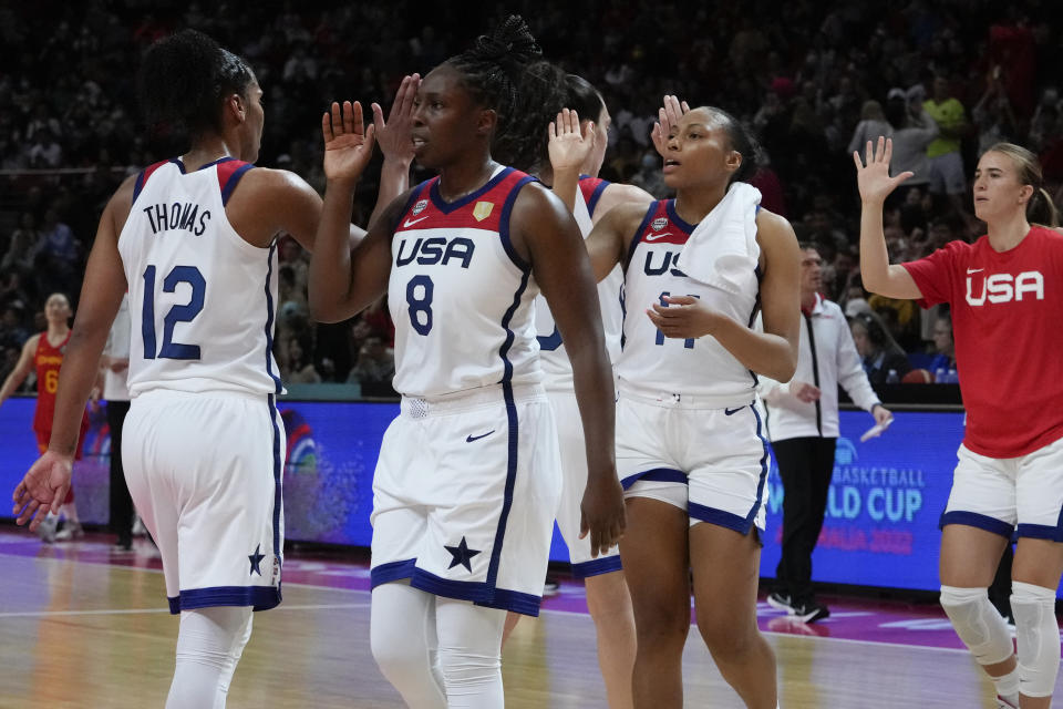 United States players celebrate after defeating China in their game at the women's Basketball World Cup in Sydney, Australia, Saturday, Sept. 24, 2022. (AP Photo/Mark Baker)