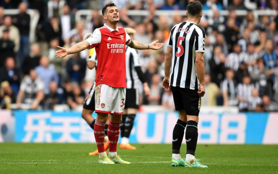 Granit Xhaka argues with Fabian Schar - Arsenal's time-wasting at Newcastle fully documented - Getty Images/Stuart MacFarlane