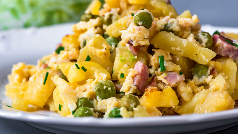 A pile of potato salad on a plate 