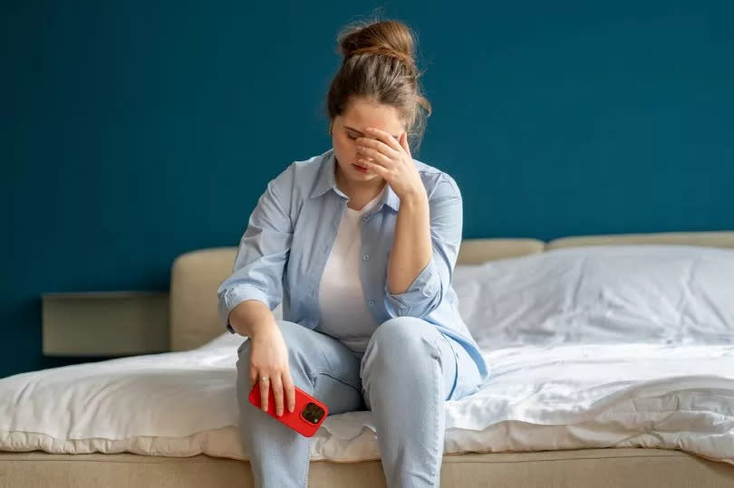 A woman feeling dizzy