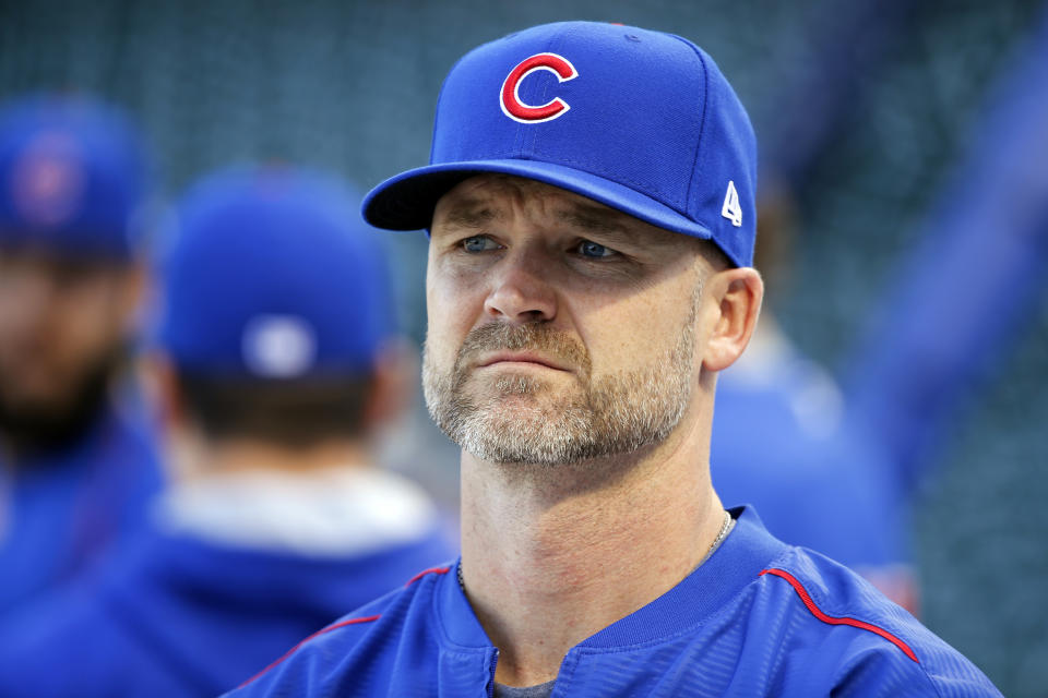 FILE - In this Oct. 14, 2016, file photo, Chicago Cubs' David Ross waits for his turn during batting practice before baseball's National League Championship Series against the Los Angeles Dodgers in Chicago. The Chicago Cubs have hired former catcher David Ross to replace Joe Maddon as their manager, hoping he can help them get back to the playoffs after missing out for the first since 2014. (AP Photo/Charles Rex Arbogast, File)