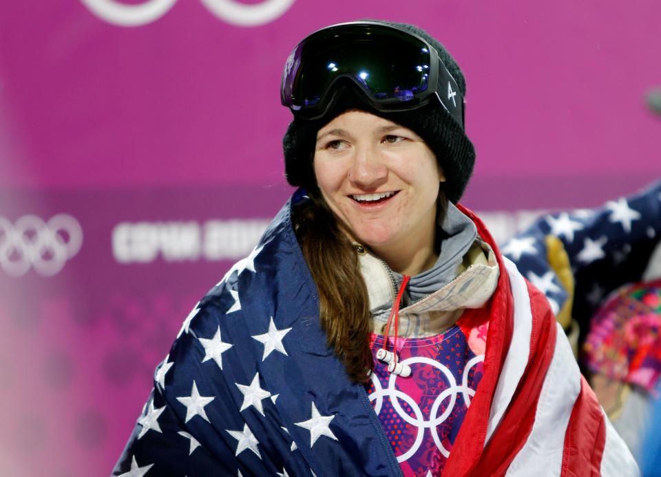 West Dover's Kelly Clark (USA) celebrates after the ladies' halfpipe finals of the Sochi 2014 Olympic Winter Games at Rosa Khutor Extreme Park.