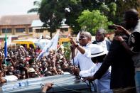 Opposition leader Martin Fayulu, addresses a crowd of his supporters during a demonstration over the independence of the country’s electoral commission, in Kinshasa