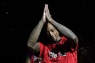 Chicago Bulls forward DeMar DeRozan (11) reacts after a video honoring him before an NBA basketball game against the San Antonio Spurs, Friday, Jan. 28, 2022, in San Antonio. (AP Photo/Eric Gay)