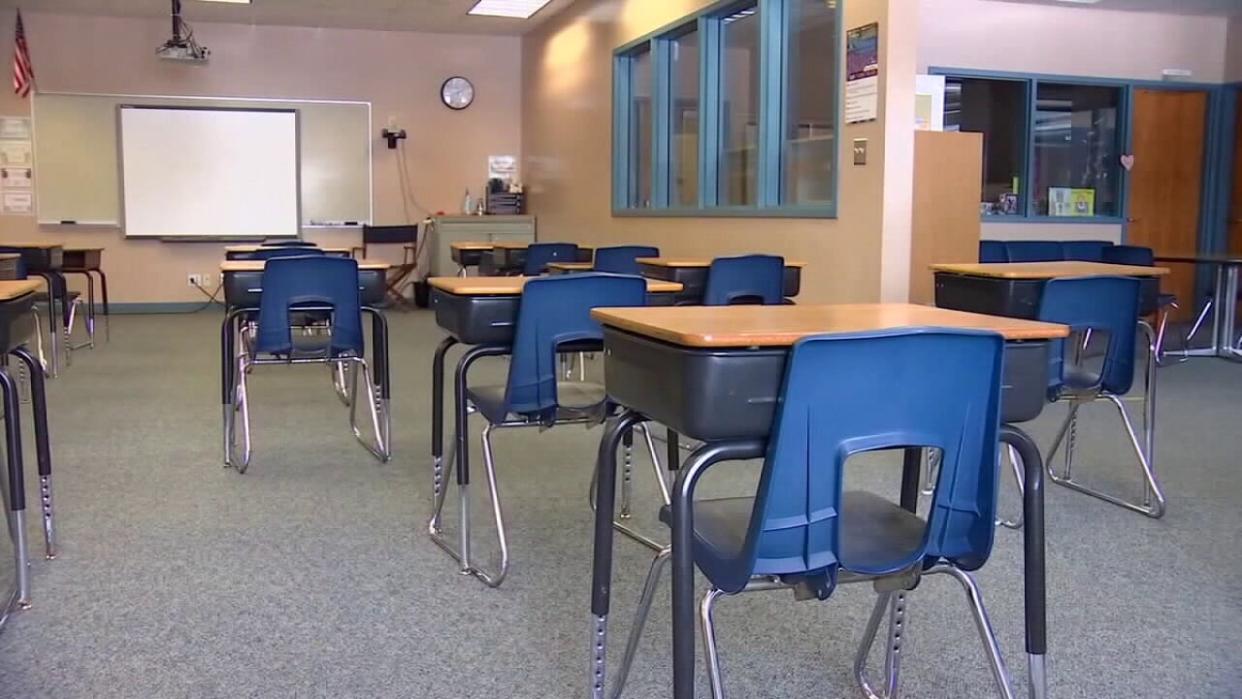 <div>File photo of desks in a classroom.</div> <strong>(FOX 9)</strong>