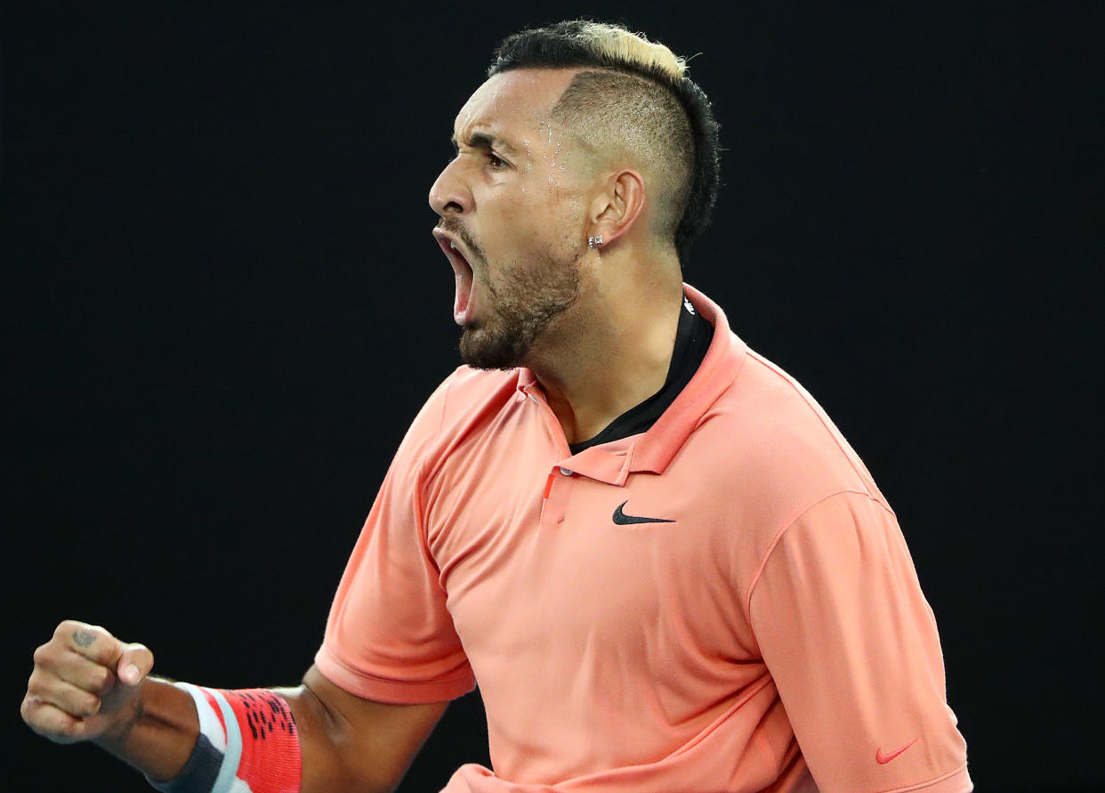 MELBOURNE, AUSTRALIA - JANUARY 27: Nick Kyrgios of Australia celebrates during his Men's Singles fourth round match against Rafael Nadal of Spain on day eight of the 2020 Australian Open at Melbourne Park on January 27, 2020 in Melbourne, Australia. (Photo by Kelly Defina/Getty Images)