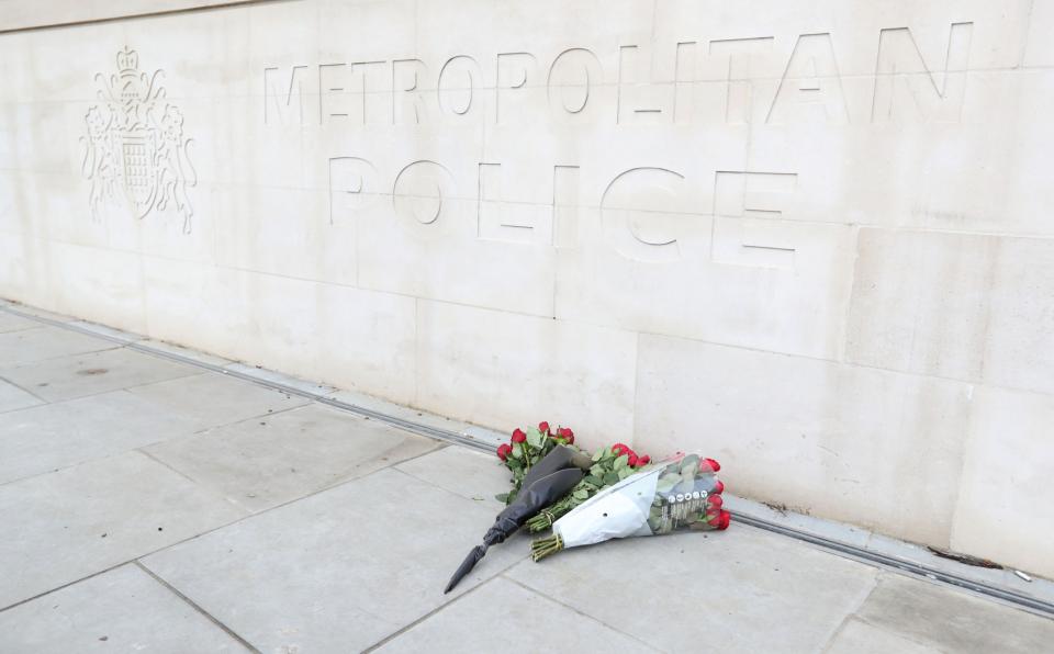 Flowers placed outside New Scotland Yard a day after terror attack