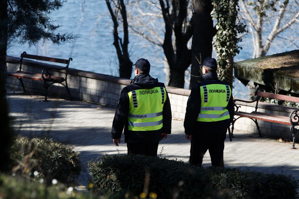 Police officers patrol the area where Kosovo's Prime Minister Albin Kurti and Serbia's President Aleksandar Vucic are to attend a high-level meeting convened by EU High Representative for Foreign Affairs and Security Policy Josep Borrell and EU Special Representative Miroslav Lajcak, at North Macedonia's lakeside resort of Ohrid, on Saturday, March 18. 2023. Western officials are hoping for progress this weekend in EU-mediated talks between Serbia's and Kosovo's leaders, in a new attempt to ease decades of tensions between the Balkan wartime foes and solve one of Europe's longest standing disputes. (AP Photo/Boris Grdanoski)