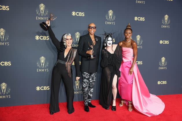 Michelle posing with RuPaul and Drag finalists Gottmik and Symone at last year's Emmys (Photo: Jay L. Clendenin via Getty Images)