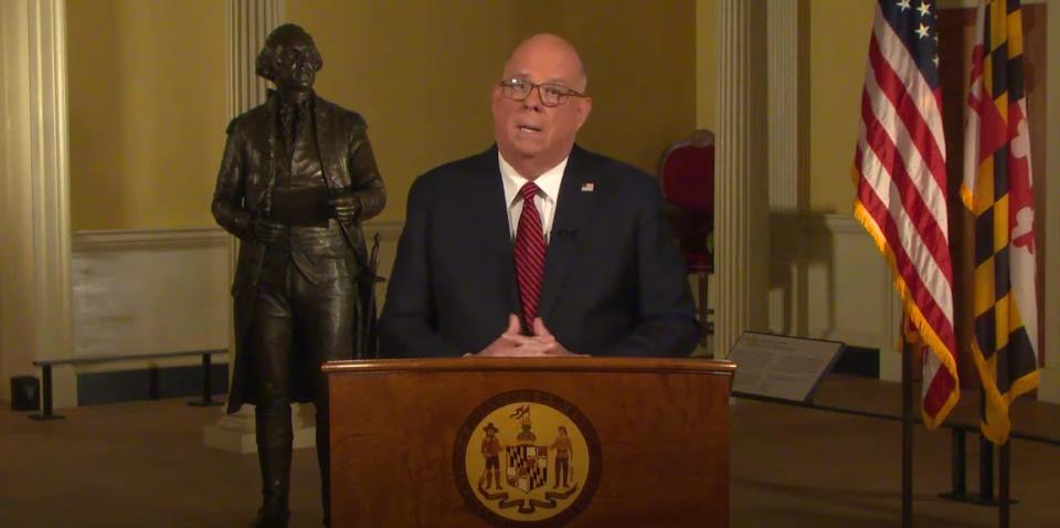 This image taken from video shows Gov. Larry Hogan as he delivers his eighth and final state of the state address Wednesday night from the Old Senate Chamber of the Maryland State House in Annapolis. The room is where Gen. George Washington, whose statue stands behind Hogan, resigned his commission as leader of the Continental Army in December 1783.