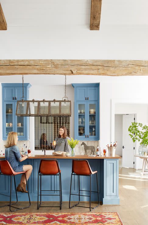 farmhouse kitchen with blue cabinets
