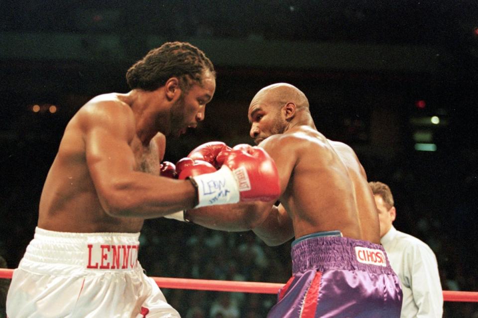 Lennox Lewis (left) beat Evander Holyfield in 1999 to become undisputed heavyweight champion (Getty)