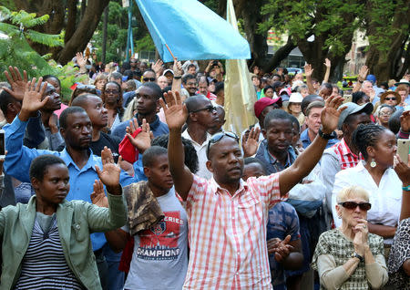 Residents attend a prayer meeting called to celebrate after Zimbabwean President Robert Mugabe was dismissed as party leader of the ruling ZANU-PF's central committee in Harare, Zimbabwe, November 19, 2017. REUTERS/Philimon Bulawayo