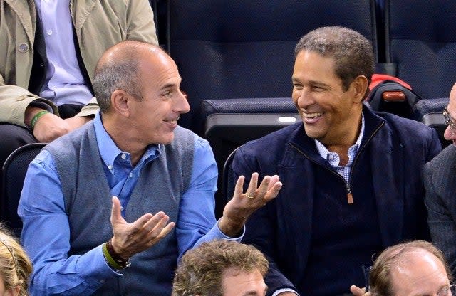 Matt Lauer and Bryant Gumbel attend the Montreal Canadiens vs. the New York Rangers at Madison Square Garden on October 28, 2013 in New York City. 