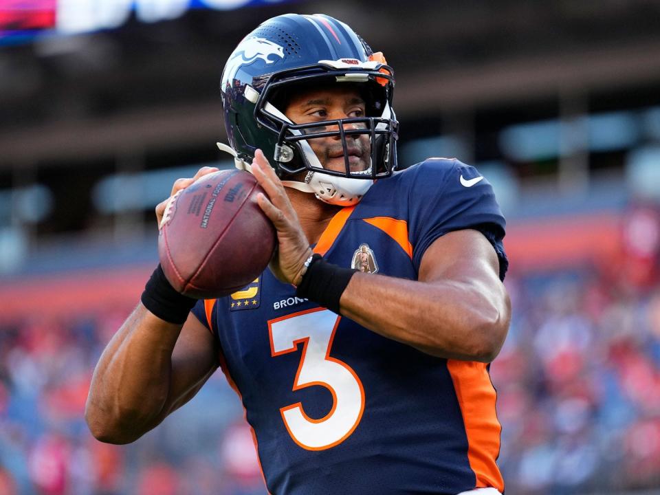 Russell Wilson warms up before a game against the San Francisco 49ers.